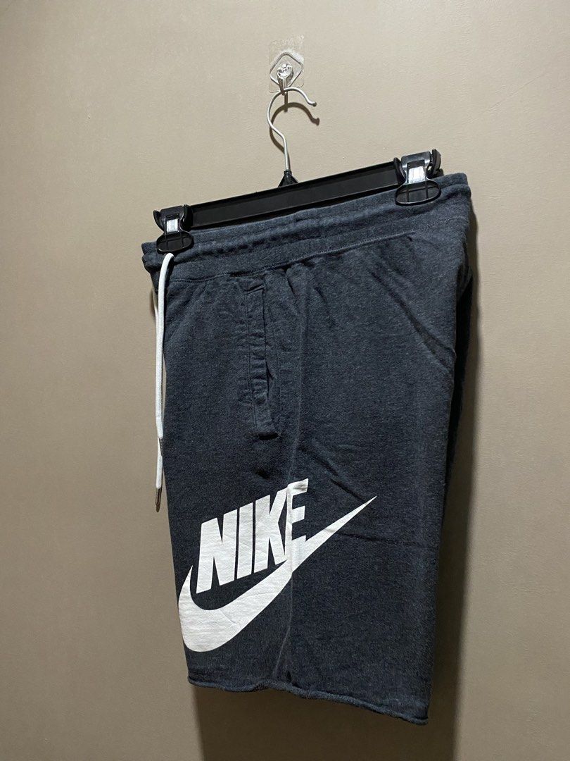Nike Alumni (Category: Shorts) located in Iloilo. Submitted by yulostreet.thrift (Listing ID 1467980906, Image 2). Description: Nike Alumni Dark gray colorway Size S on tags Complete tags 30-32 waist 18.5 length 10 leg opening Features the iconic nike spellout on the side. 9.7/10 color rate Excellent condition.