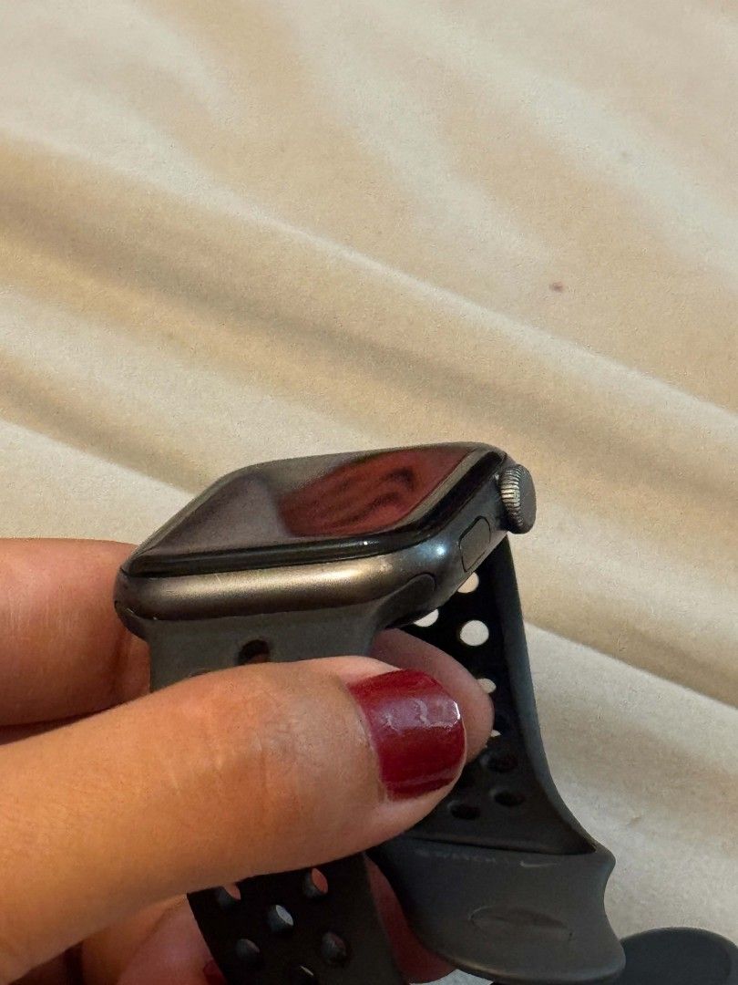 Nike Apple Watch SE 44mm (Category: Wearables & Smart Watches) located in Quezon City. Submitted by mikifj (Listing ID 1467977533, Image 3). Description: - Model: A2352 - Condition: Minimal scratches - Battery health: 69% - Inclusions: Charger and strap - Price: ₱4,000 Used as daily watch. C an last 2 days. Still a good option for someone looking for an affordable Apple Watch. Battery health is disclosed, and buyer is welcome to test the unit upo