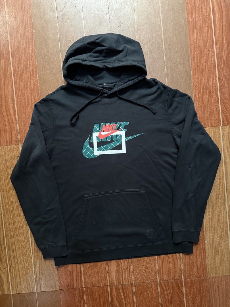 Nike Black Graphic Hoodie (Category: Hoodies) located in Dasmarinas. Submitted by kylebecker (Listing ID 1467943949, Image 1). Description: - Brand: Nike - Color: Black with multi-color graphic print and red swoosh - Material: Soft and comfortable cotton blend - Features: Front kangaroo pocket, adjustable drawstring hood, ribbed cuffs and hem - Condition: Excellent / Well-maintained - Style: Casual streetwear - Mode of Payment: GCash, BPI, or Ban