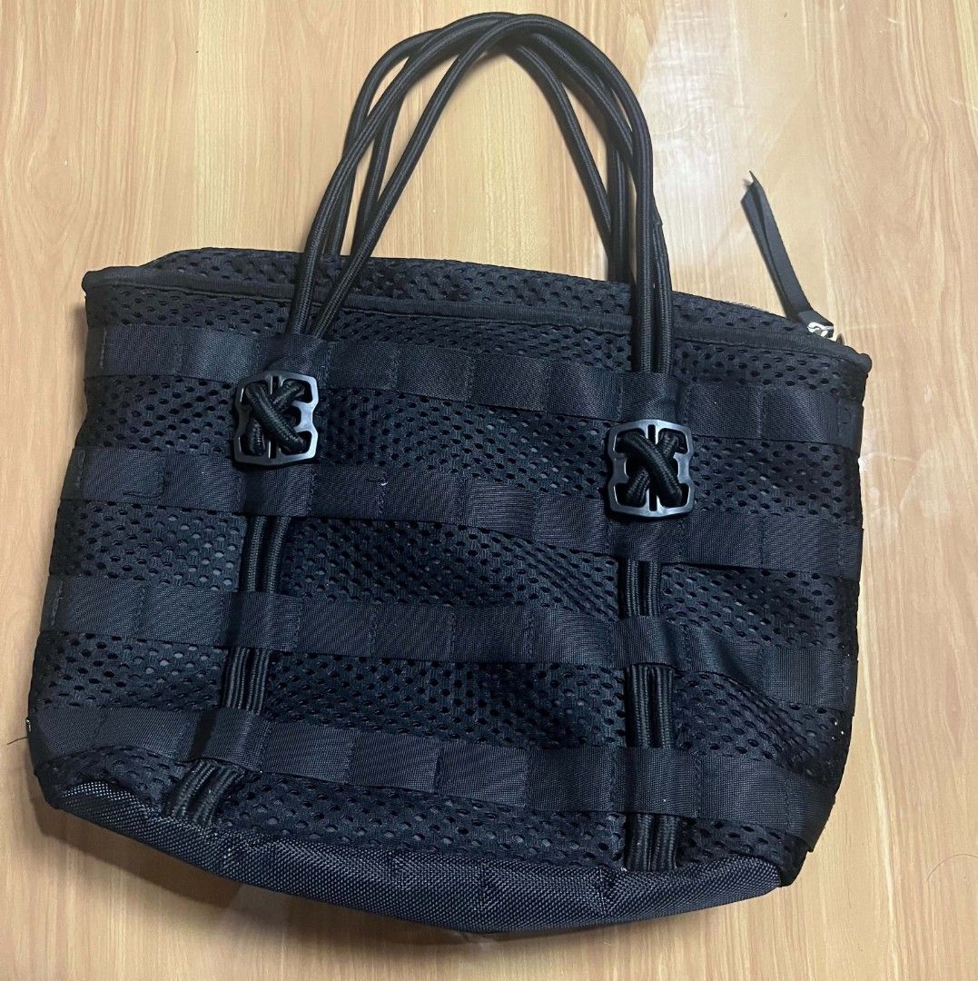Nike Black Mesh Utility Tote Bag (Category: Tote Bags) located in Manila. Submitted by senggggg. (Listing ID 1468028108, Image 3). Description: good condition working zip no hidden issue check details and size.
