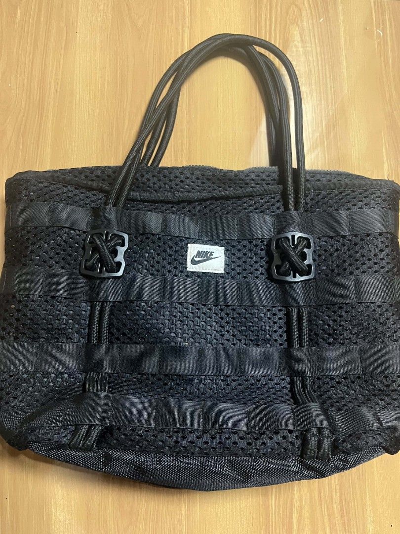 Nike Black Mesh Utility Tote Bag (Category: Tote Bags) located in Manila. Submitted by senggggg. (Listing ID 1468028108, Image 2). Description: good condition working zip no hidden issue check details and size.