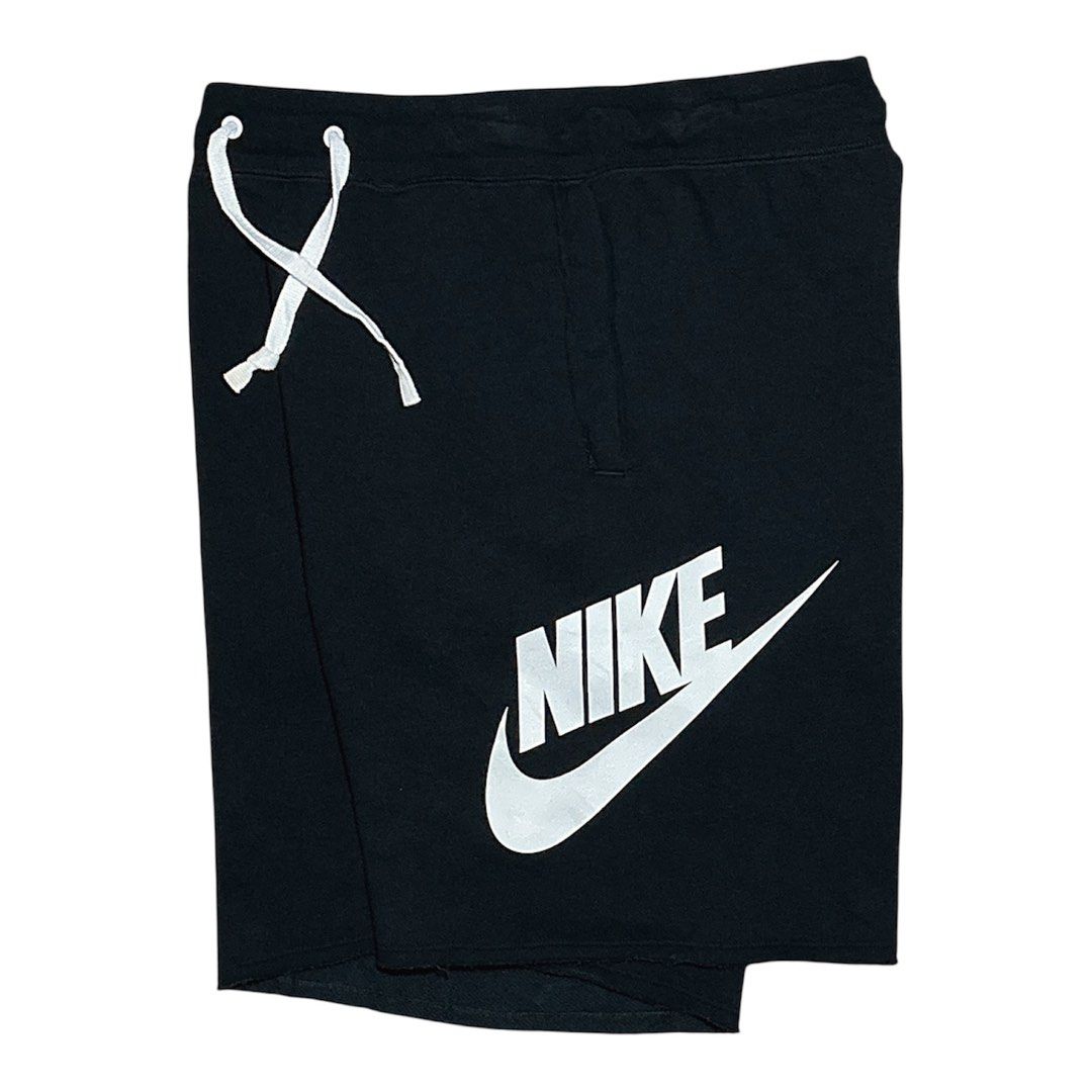 Nike Black Shorts with White Logo Size M (Category: Shorts) located in Naga. Submitted by lootersfinder (Listing ID 1467974720, Image 1). Description: - Brand: Nike - Style Code: AR2376-010 - Size: Medium (M) - Color: Black with large white swoosh logo - Material: 58% Cotton, 23% Rayon (cotton blend) - Features: Elastic waistband with white drawstring cords, convenient side pockets - Condition: Brand new with tags.