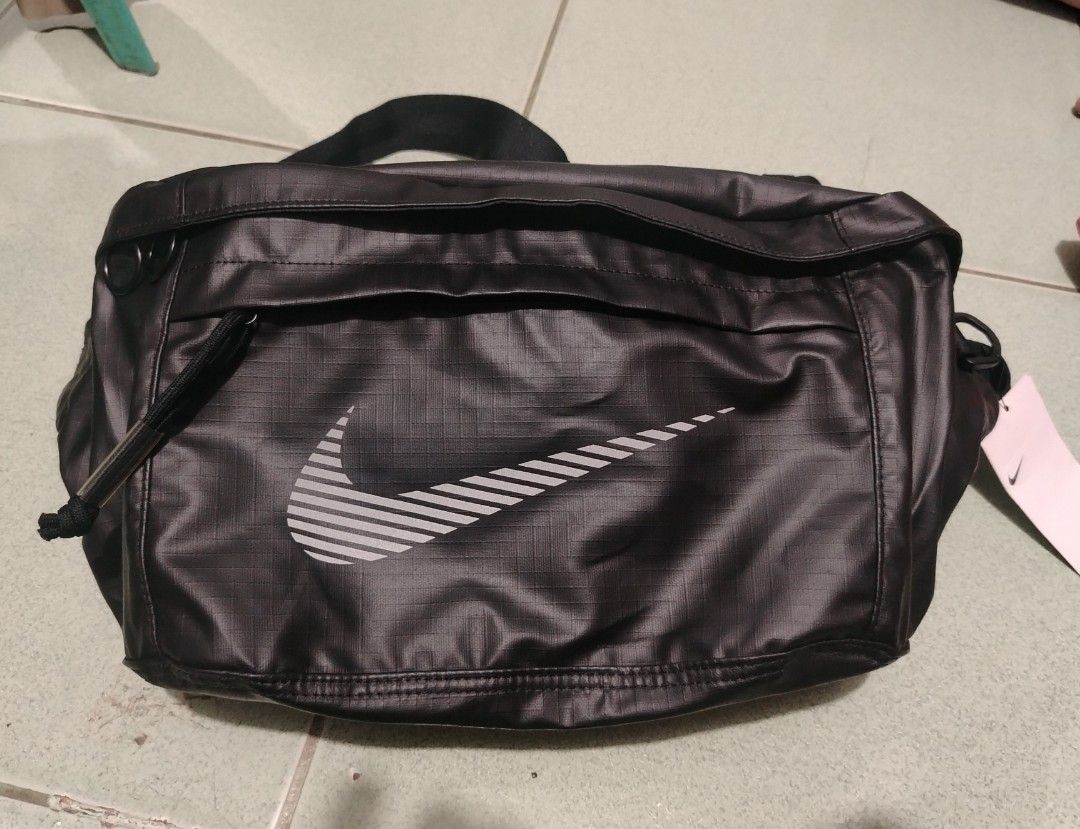 Nike cross bag (Category: Belt bags, Clutches and Pouches) located in Bocaue. Submitted by adrianberi35876 (Listing ID 1467928445, Image 2). Description: Nike Cross bag Reflectorize Logo As new Condition With hangtag 📩 📩 📩 📍 Bocaue,Bulacan.
