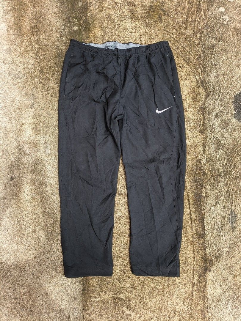 Nike Dri-Fit Black Track Pants Size L (Category: Joggers) located in Manila. Submitted by gamierjohn28952 (Listing ID 1467942691, Image 1). Description: - Brand: Nike - Style: Dri-Fit Pants (Style Code: 688498-010) - Size: Large - Color: Black with white embroidered swoosh logo - Material/Features: Elastic waistband with interior mesh lining - Origin: Made in China - Condition: Great for workouts or casual wear - PM for inquiries or fast check-ou