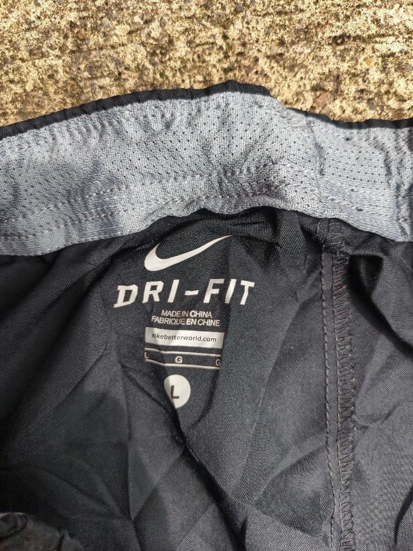 Nike Dri-Fit Black Track Pants Size L (Category: Joggers) located in Manila. Submitted by gamierjohn28952 (Listing ID 1467942691, Image 3). Description: - Brand: Nike - Style: Dri-Fit Pants (Style Code: 688498-010) - Size: Large - Color: Black with white embroidered swoosh logo - Material/Features: Elastic waistband with interior mesh lining - Origin: Made in China - Condition: Great for workouts or casual wear - PM for inquiries or fast check-ou