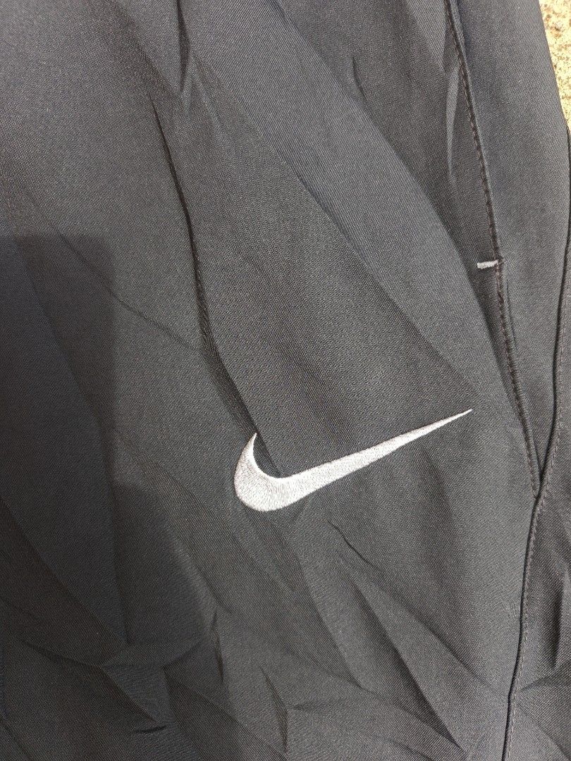 Nike Dri-Fit Black Track Pants Size L (Category: Joggers) located in Manila. Submitted by gamierjohn28952 (Listing ID 1467942691, Image 2). Description: - Brand: Nike - Style: Dri-Fit Pants (Style Code: 688498-010) - Size: Large - Color: Black with white embroidered swoosh logo - Material/Features: Elastic waistband with interior mesh lining - Origin: Made in China - Condition: Great for workouts or casual wear - PM for inquiries or fast check-ou
