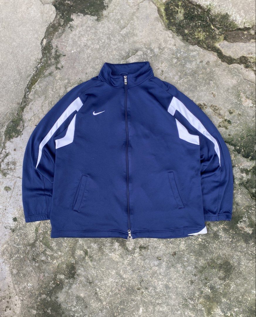 Nike Dri-fit Track Jacket (Category: Coats, Jackets and Outerwear) located in Manila. Submitted by zefrylle_co (Listing ID 1467925253, Image 1). Description: - Excellent condition - No issue - Double zip - Embroidered logo - Ready to wear - L - XL DM to purchase!.