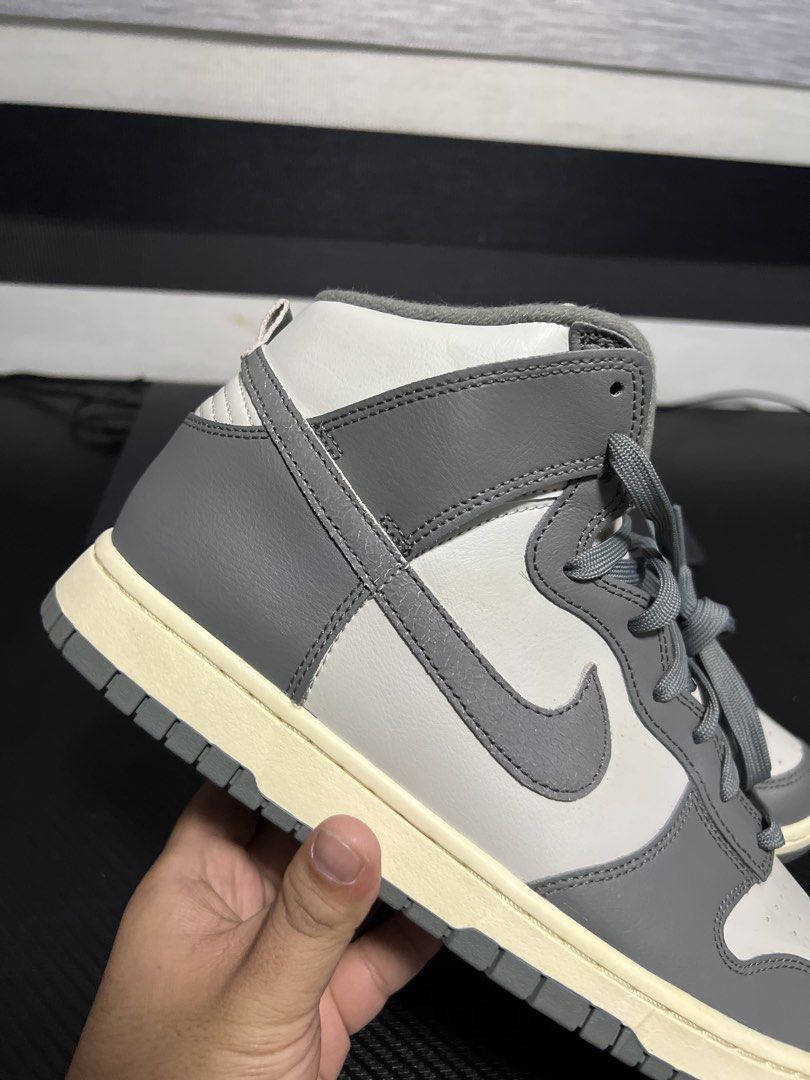 Nike Dunk High VTG Grey White (Category: Sneakers) located in Calasiao. Submitted by pb.supply_v2 (Listing ID 1468051086, Image 2). Description: - Brand: Nike Dunk High AUTHENTIC! - Colorway: Grey and White - Style: High-top silhouette with classic paneled leather upper - Details: Matching grey swoosh, grey laces, and perforated toe box for breathability - Sole: Trendy aged-look midsole with durable grey outsole - Comfort: Padded collar for extra