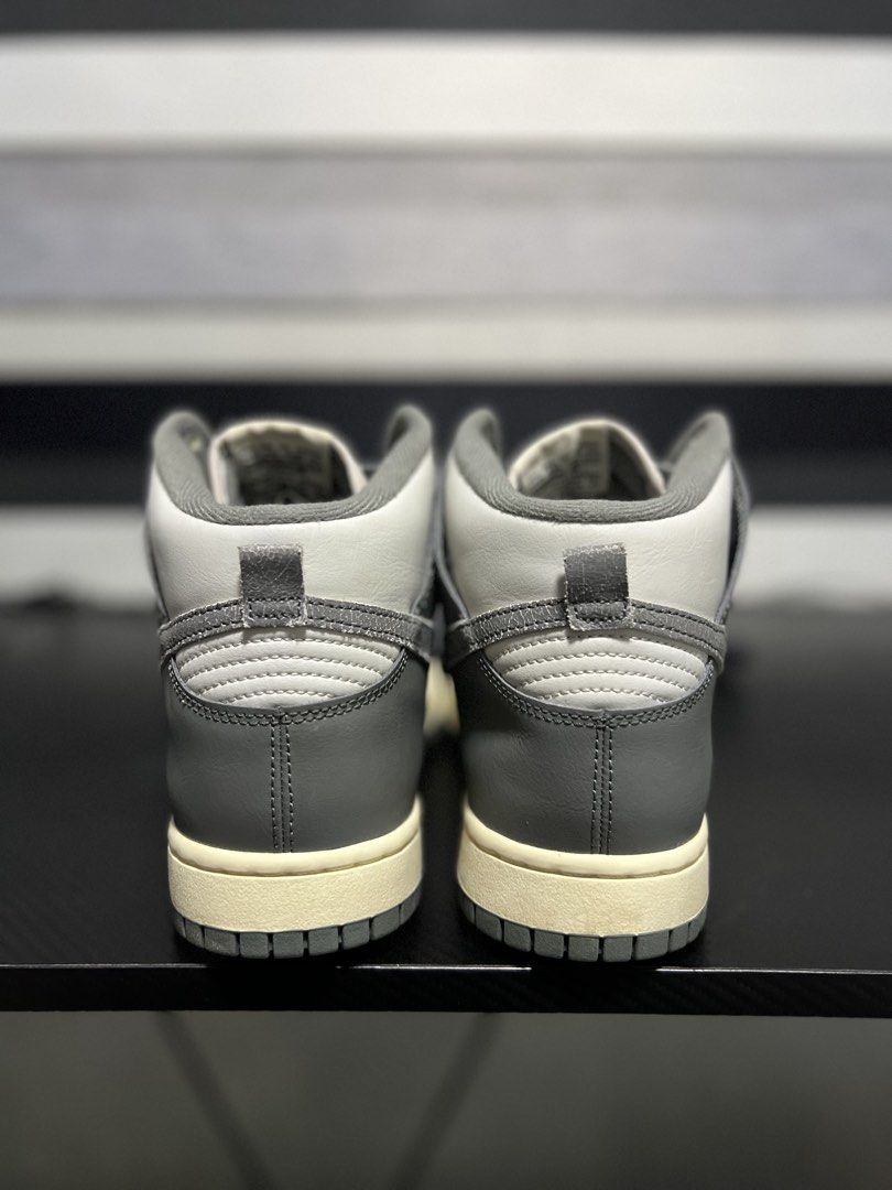 Nike Dunk High VTG Grey White (Category: Sneakers) located in Calasiao. Submitted by pb.supply_v2 (Listing ID 1468051086, Image 3). Description: - Brand: Nike Dunk High AUTHENTIC! - Colorway: Grey and White - Style: High-top silhouette with classic paneled leather upper - Details: Matching grey swoosh, grey laces, and perforated toe box for breathability - Sole: Trendy aged-look midsole with durable grey outsole - Comfort: Padded collar for extra