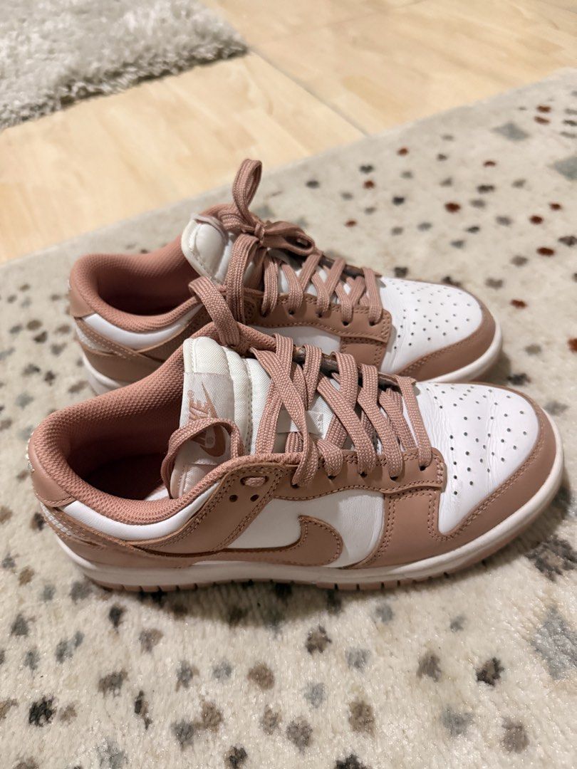 Nike Dunk Low Rose Whisper DD1503-118 (Category: Sneakers) located in Mandaluyong City. Submitted by riz_040521 (Listing ID 1467864277, Image 2). Description: - Item: Nike Dunk Low - Colorway: Rose Whisper (White leather base with dusty pink overlays, laces, and inner lining) - Size: US 6 / EUR 36.5 - Condition: Worn a few times, minimal crease on the toe box, soles still clean - Authenticity: Verified via size tag - No box - ORIGINAL BOUGHT IN J