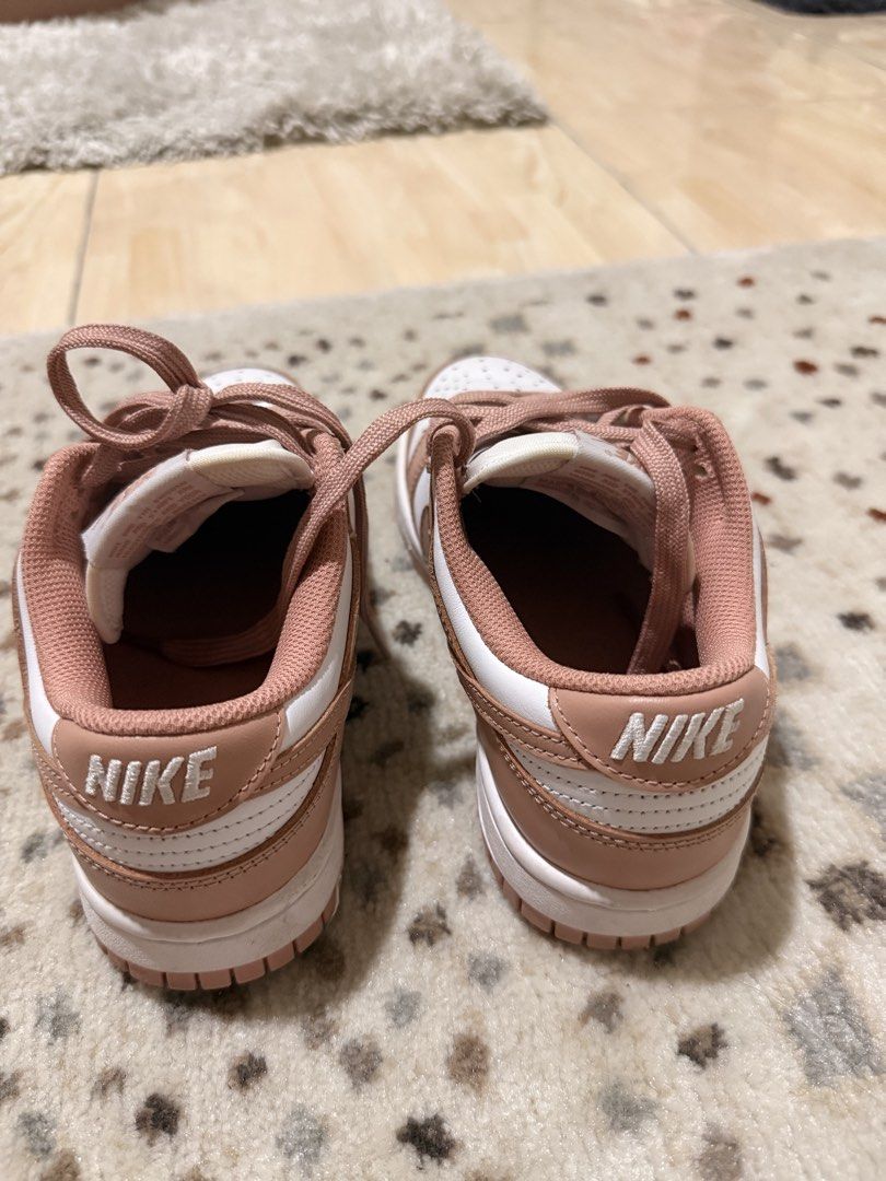 Nike Dunk Low Rose Whisper DD1503-118 (Category: Sneakers) located in Mandaluyong City. Submitted by riz_040521 (Listing ID 1467864277, Image 3). Description: - Item: Nike Dunk Low - Colorway: Rose Whisper (White leather base with dusty pink overlays, laces, and inner lining) - Size: US 6 / EUR 36.5 - Condition: Worn a few times, minimal crease on the toe box, soles still clean - Authenticity: Verified via size tag - No box - ORIGINAL BOUGHT IN J