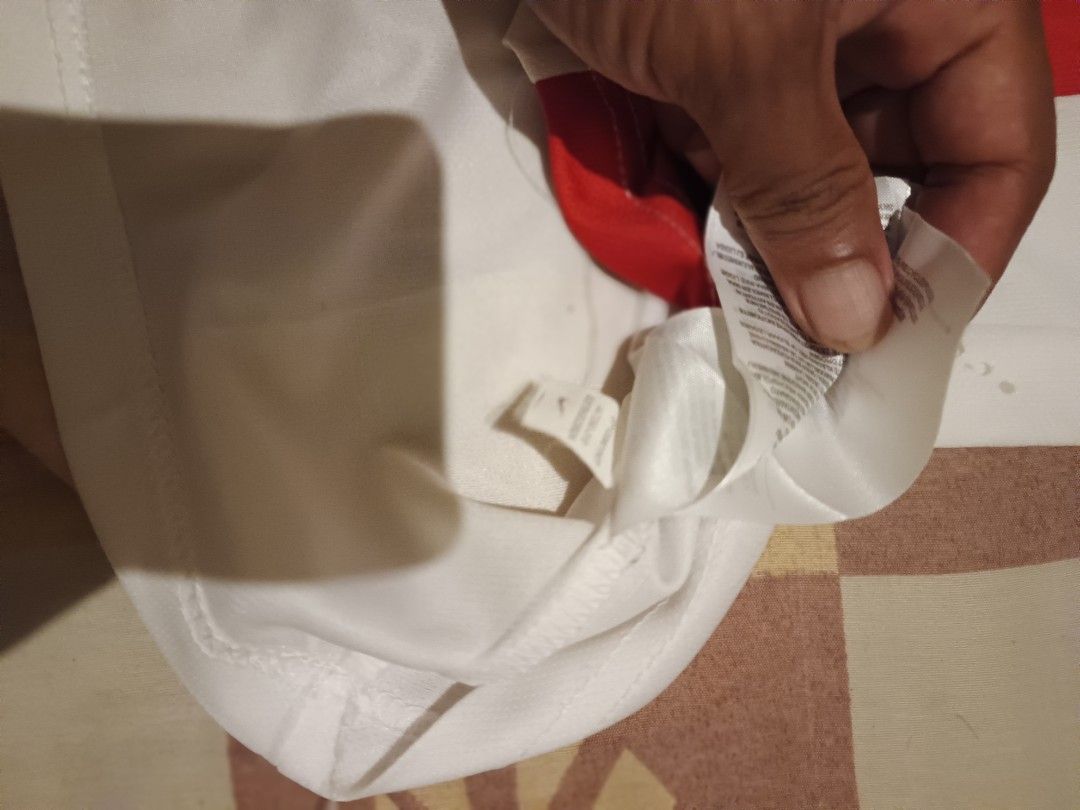 Nike football jersey (Category: Activewear) located in Odiongan. Submitted by thriftngo26 (Listing ID 1467976373, Image 3). Description: This item is an official Nike China National Football Team 2015 Away Jersey. [1].