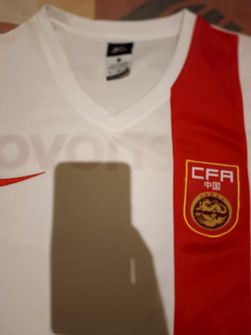 Nike football jersey (Category: Activewear) located in Odiongan. Submitted by thriftngo26 (Listing ID 1467976373, Image 2). Description: This item is an official Nike China National Football Team 2015 Away Jersey. [1].