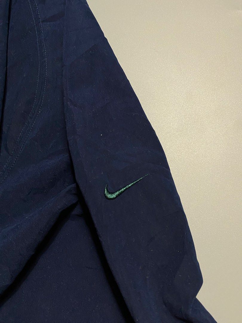 Nike Golf Jacket Navy Blue💥 (Category: Coats, Jackets and Outerwear) located in Cebu City. Submitted by covenanthrifts (Listing ID 1467970318, Image 2). Description: Width x Length: 29x29 Size on Tag: XL, (But Fit to XXL) Color rate: 9.5/10 Issue: Small hole (SEE LAST PHOTO) Very Good Condition.