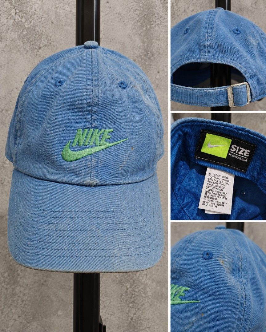 Nike Heritage86 Blue Cap (Category: Caps & Hats) located in Taguig. Submitted by roniquefinds (Listing ID 1467863639, Image 1). Description: - Brand: Nike (Heritage86 model) - Color: Light blue with green embroidered logo - Material: Cotton blend - Closure: Adjustable metal strap at the back - Condition: Normal signs of wear throughout, inner tags included.