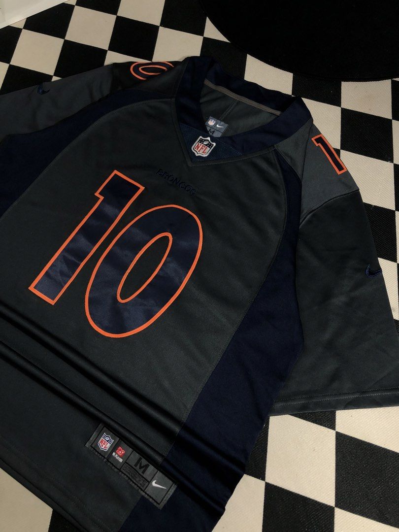 Nike Jersey Grey Size Medium. Dimes: 23X31.5 (Category: Activewear) located in Manila. Submitted by ejaay_2012 (Listing ID 1467867144, Image 3). Description: - Authentic Nike On Field Denver Broncos jersey - Player: Jeudy (#10) - Colorway: Navy blue and grey with orange numbers and lettering - Size: Medium (tag on hem) - Features: Stitched numbers/letters, NFL shield at v-neck - Condition: Clean fabric, great for game days or streetwear.