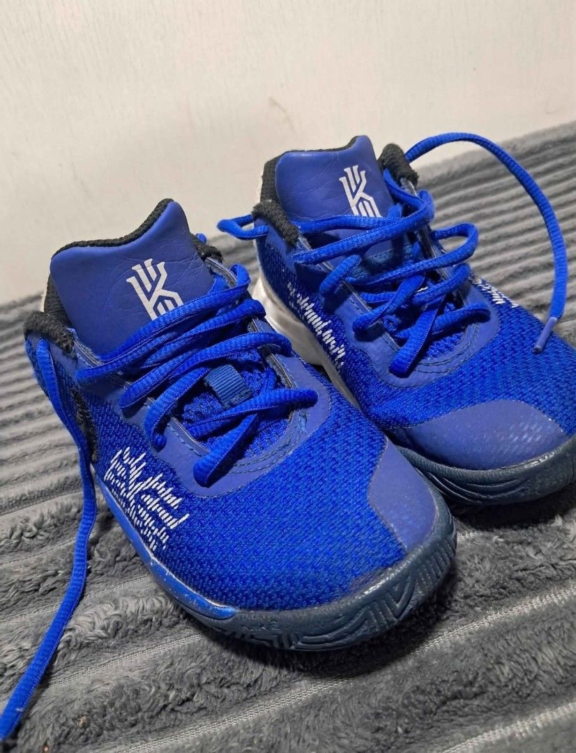 Nike KIDS Kyrie FLYTRAP 2 DUKE Blue (Category: Babies & Kids Fashion) located in Manila. Submitted by silvershot.11 (Listing ID 1467848881, Image 2). Description: Pre Loved. Good Condition. Imported Design is identical to adult version. few signs of usage but all goods! konting laba lang magmumukhang bago na ulit. No stains. No holes. No toedrags. No sole seps. konting scuffs lang..