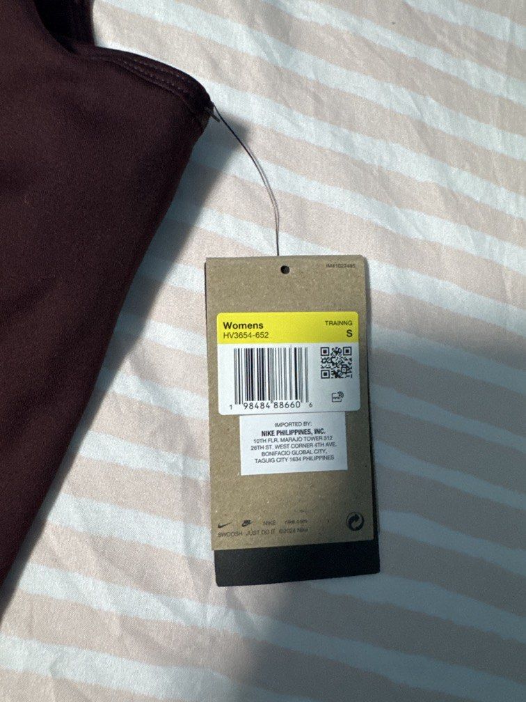 Nike Maroon Tank Top (Category: Activewear) located in Pasig City. Submitted by closet_declut95 (Listing ID 1467947898, Image 2). Description: Brand new with tag Rfs: wrong size .