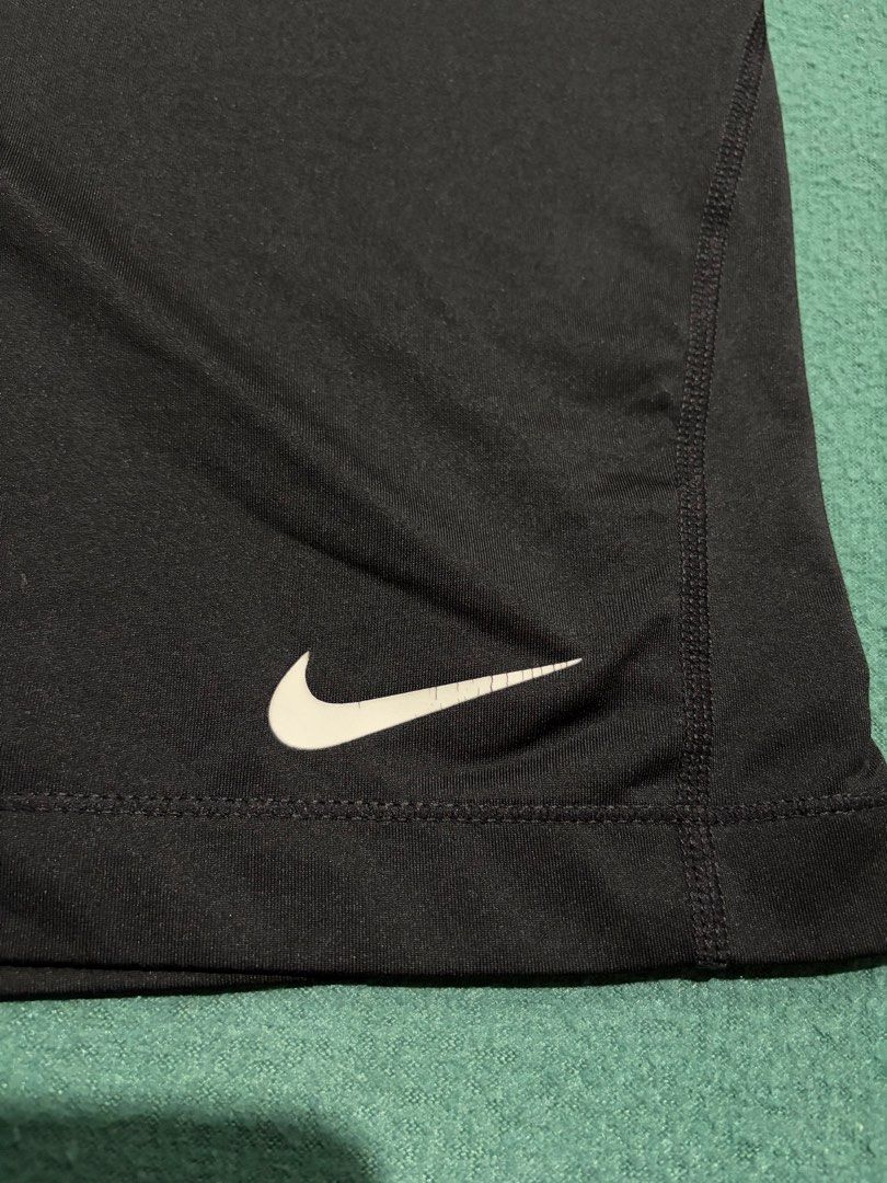 Nike Pro Black Compression Athletic Shorts Size L (Category: Shorts) located in Guihulngan. Submitted by fbthriftgoodsniace (Listing ID 1467915610, Image 2). Description: Black athletic compression shorts from Nike. Branded elastic waistband, white swoosh logo printed on the lower left leg. 80% polyester and 20% spandex material mix. Manufactured in Vietnam. Standard size L label inside. Machine washable guidelines printed on the inner tag. -Larg