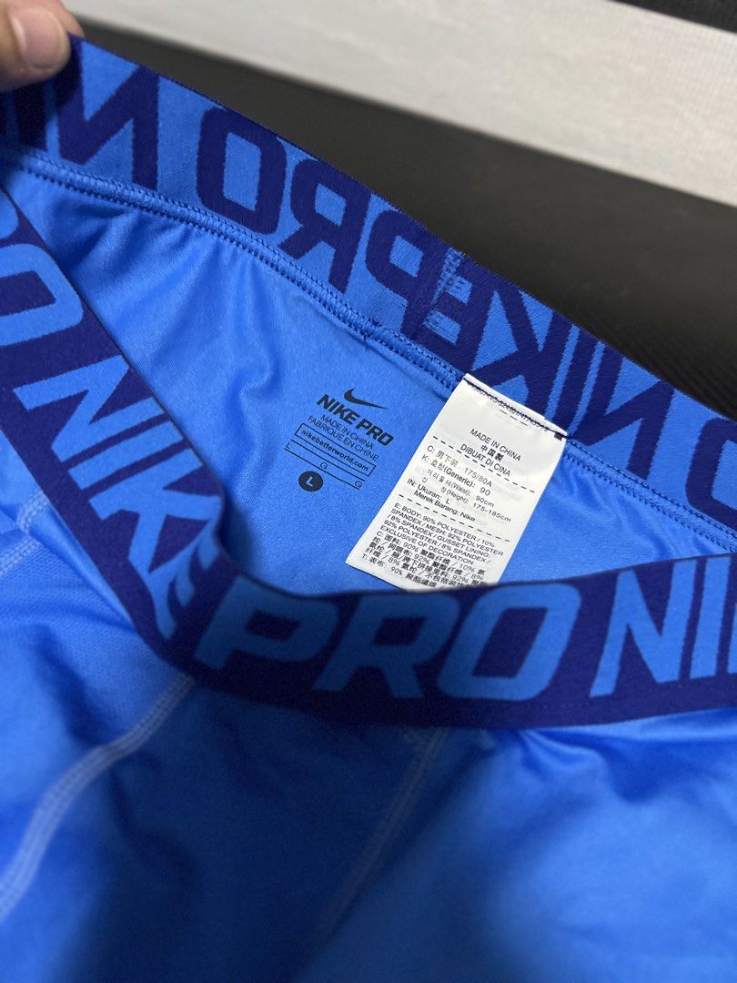 Nike Pro Blue Compression Tights Size L (Category: Activewear) located in Calasiao. Submitted by pb.supply_v2 (Listing ID 1468050742, Image 3). Description: Bright blue Nike Pro compression tights in size Large. Gradient pattern running down the legs with a signature swoosh logo. Elastic waistband featuring repeated Nike Pro branding. Made from breathable polyester and spandex blend. Great athletic wear for workouts, running, or gym sessions..