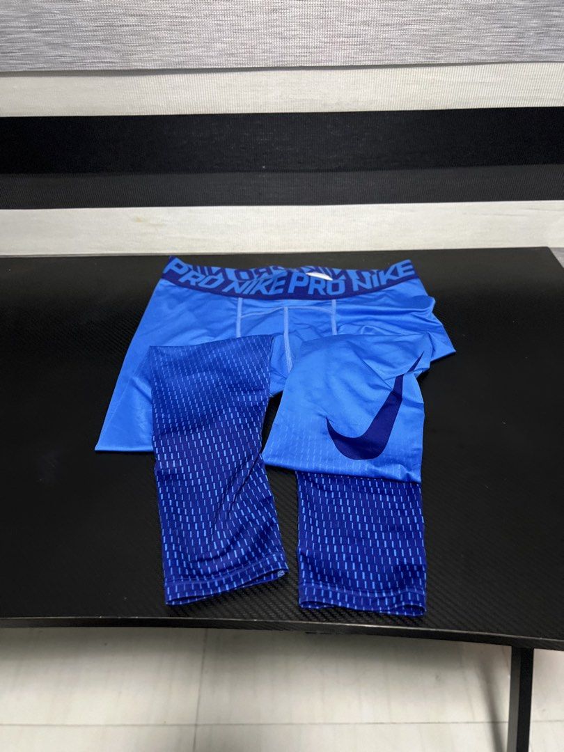 Nike Pro Blue Compression Tights Size L (Category: Activewear) located in Calasiao. Submitted by pb.supply_v2 (Listing ID 1468050742, Image 1). Description: Bright blue Nike Pro compression tights in size Large. Gradient pattern running down the legs with a signature swoosh logo. Elastic waistband featuring repeated Nike Pro branding. Made from breathable polyester and spandex blend. Great athletic wear for workouts, running, or gym sessions..