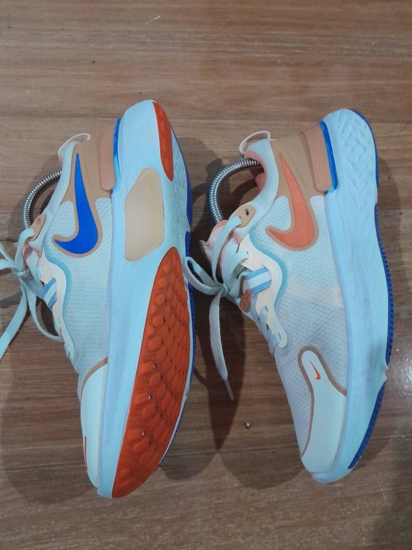 Nike React Miler Running Shoes White Orange Blue (Category: Sneakers) located in Calamba. Submitted by ysabellascloset17 (Listing ID 1468018355, Image 3). Description: - Brand: Nike React Miler - Colorway: White, orange, and blue - Upper: Breathable mesh with secure lace-up closure - Midsole: Cushioned React foam for all-day comfort - Outsole: Durable textured rubber with high-traction pods - Condition: Normal signs of wear on soles, overall grea