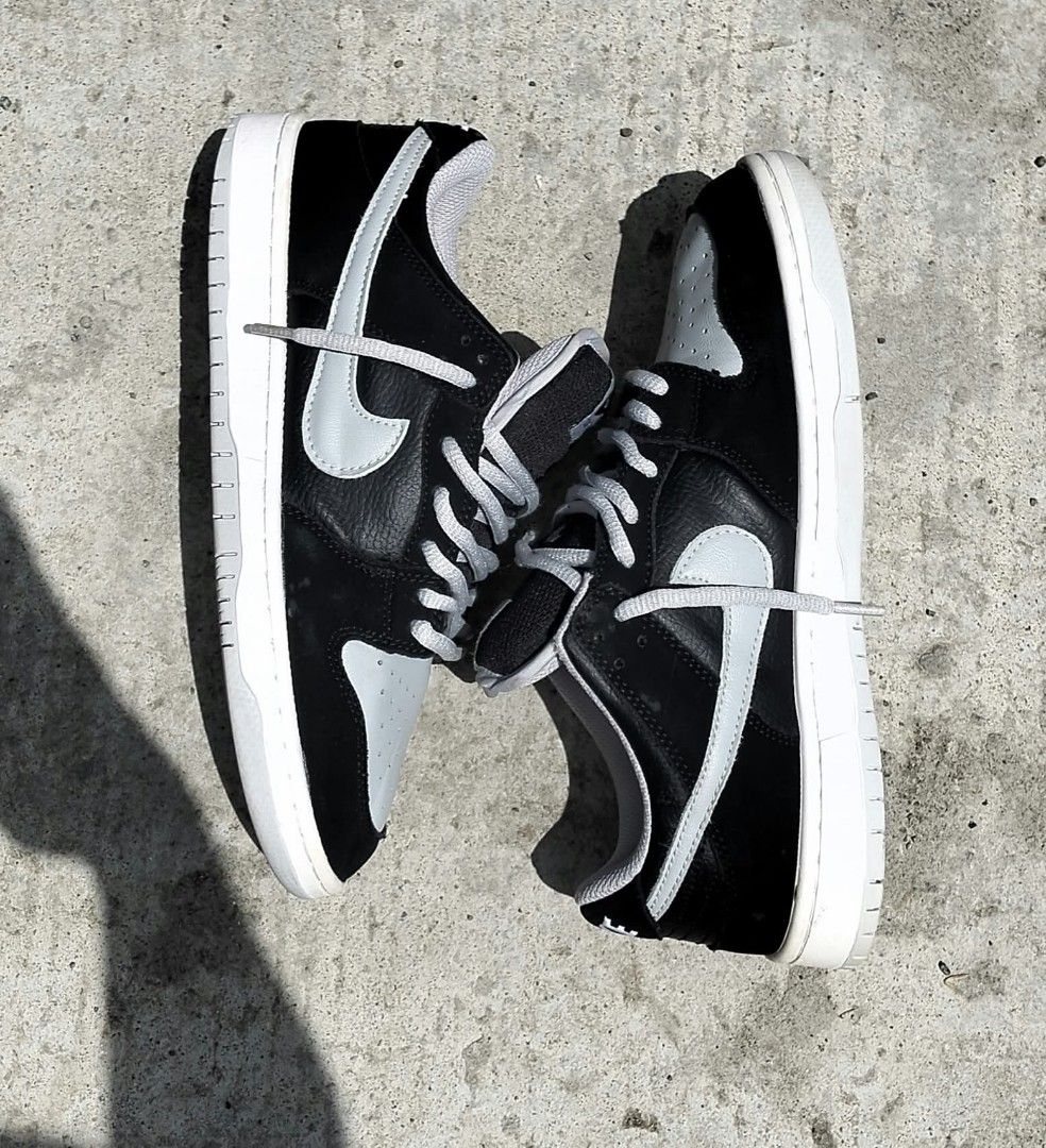 Nike SB Dunk Low Pro Black Grey (Category: Sneakers) located in Iloilo. Submitted by yoleomf6969 (Listing ID 1467882948, Image 2). Description: - Brand/Model: Nike SB Dunk Low Pro - Colorway: Classic Black and Grey - Details: Padded tongue with Nike SB tag and chunky grey laces - Condition: Clean overall shape, grippy outsoles, and light scuffing on the toes of the white midsoles - Versatility: Great for both skating and everyday casual wear.