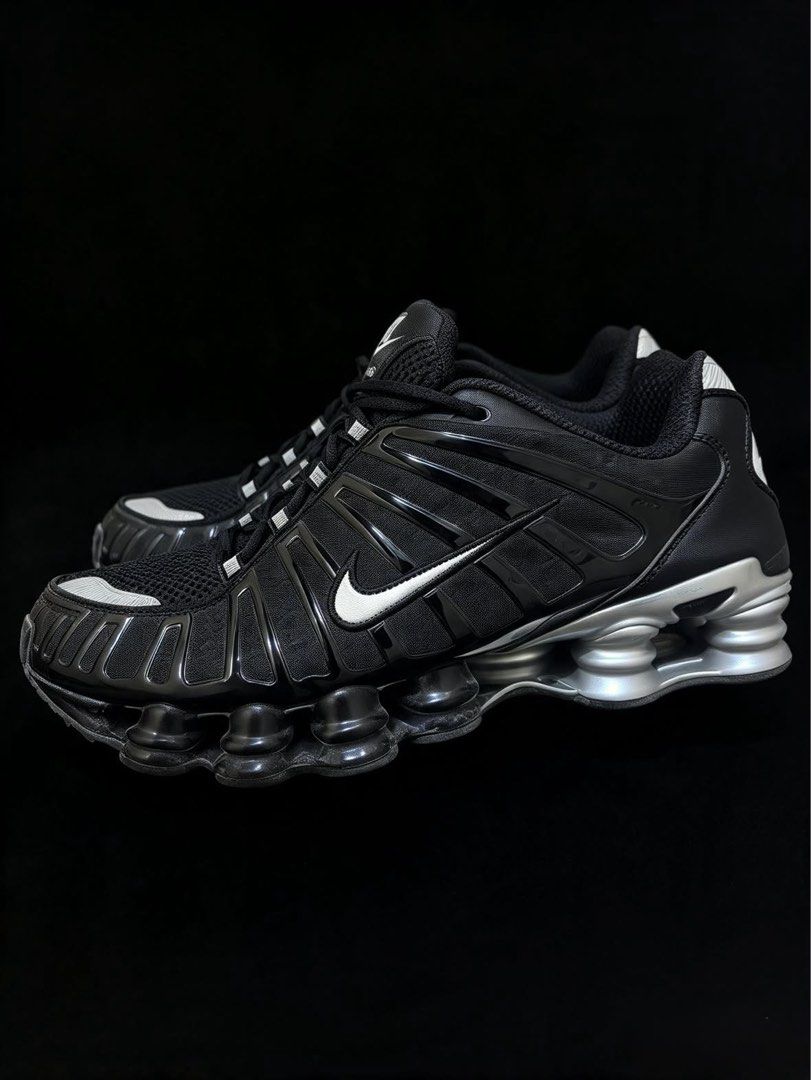 Nike Shox TL Black Metallic Silver (Category: Sneakers) located in Las Pinas. Submitted by 2fly.margiela (Listing ID 1467871186, Image 3). Description: - Model: Nike Shox TL - Colorway: Black and Metallic Silver - Cushioning: Iconic full-length Shox columns for maximum impact absorption - Design: Breathable mesh upper, glossy TPU cage overlays, and reflective details on toe and lace loops - Branding: Classic Swoosh on sides and Shox logo on tongu