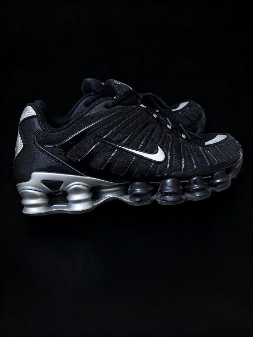 Nike Shox TL Black Metallic Silver (Category: Sneakers) located in Las Pinas. Submitted by 2fly.margiela (Listing ID 1467871186, Image 2). Description: - Model: Nike Shox TL - Colorway: Black and Metallic Silver - Cushioning: Iconic full-length Shox columns for maximum impact absorption - Design: Breathable mesh upper, glossy TPU cage overlays, and reflective details on toe and lace loops - Branding: Classic Swoosh on sides and Shox logo on tongu