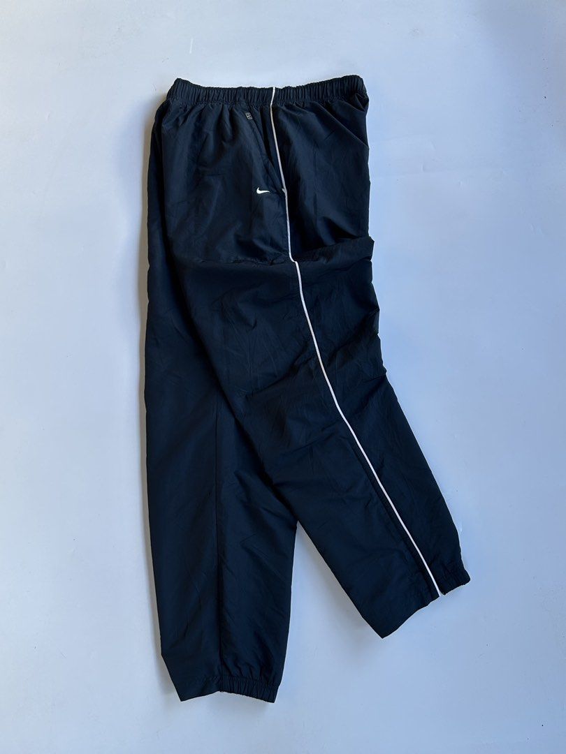 Nike track pants (Category: Joggers) located in Dasmarinas. Submitted by lencianola35953 (Listing ID 1467944779, Image 3). Description: waist: 28-42 length: 41 hem: 7.5 color rate: 9/10 no issue.
