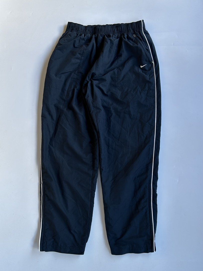 Nike track pants (Category: Joggers) located in Dasmarinas. Submitted by lencianola35953 (Listing ID 1467944779, Image 1). Description: waist: 28-42 length: 41 hem: 7.5 color rate: 9/10 no issue.