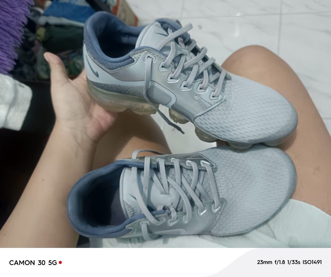 Nike VaporMax Light Blue Size 6.5Y 39 (Category: Sneakers) located in Manila. Submitted by cleverearth.ed94b6 (Listing ID 1467997022, Image 1). Description: - Brand: Nike VaporMax - Color: Light Blue and Grey - Size: US 6.5Y | UK 6 | EUR 39 | 24.5 cm - Condition: Clean inside and out, well-maintained - Material/Design: Breathable mesh upper with signature side Swoosh and VaporMax heel tab - Sole: Translucent air cushion sole for ultimate daily co