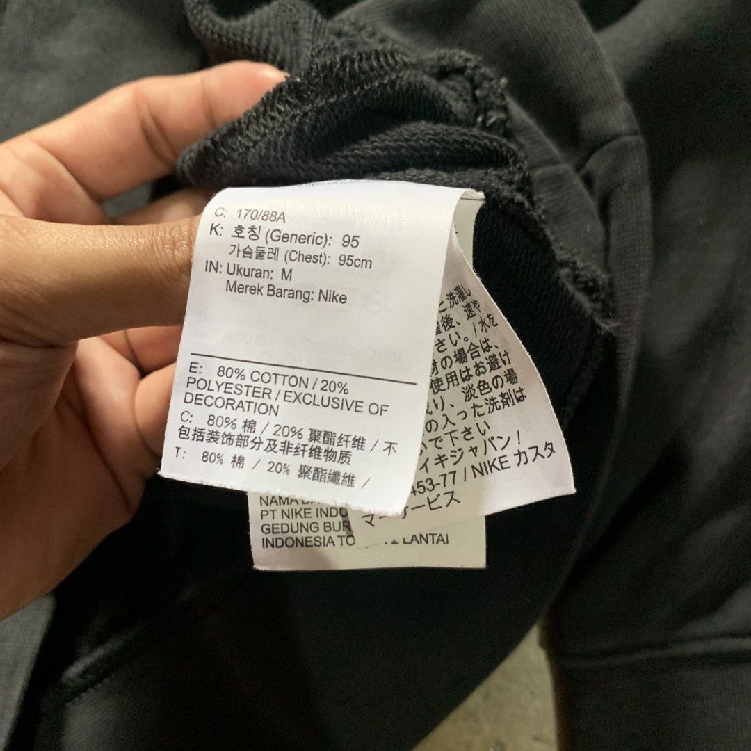 Nike Vintage Washed Black Sweatshirt Size M (Category: Coats, Jackets and Outerwear) located in Valenzuela. Submitted by jaejoe (Listing ID 1467908175, Image 3). Description: Size: Medium - Large Issue: Small Stain Location: Caybiga, North Caloocan Courier: JNT Express.