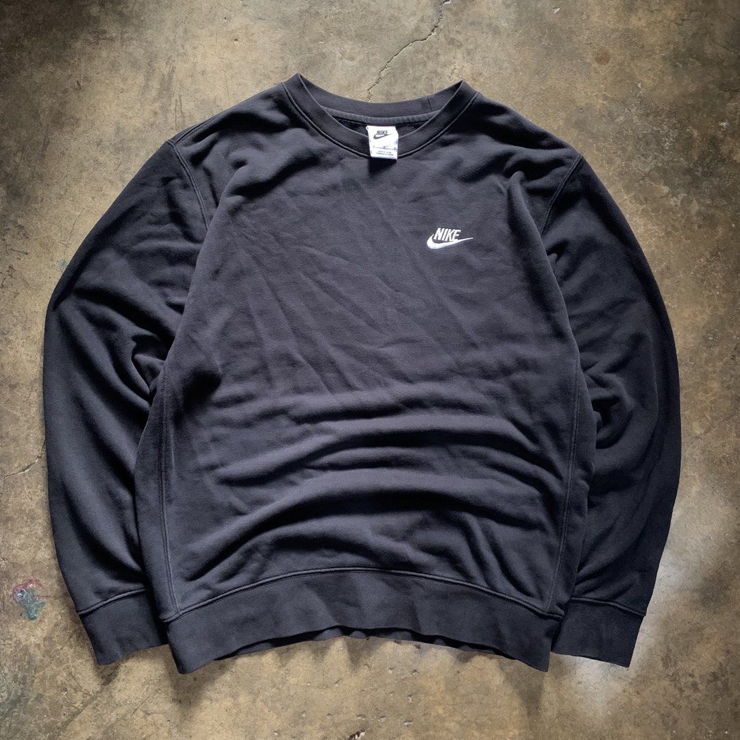 Nike Vintage Washed Black Sweatshirt Size M (Category: Coats, Jackets and Outerwear) located in Valenzuela. Submitted by jaejoe (Listing ID 1467908175, Image 1). Description: Size: Medium - Large Issue: Small Stain Location: Caybiga, North Caloocan Courier: JNT Express.