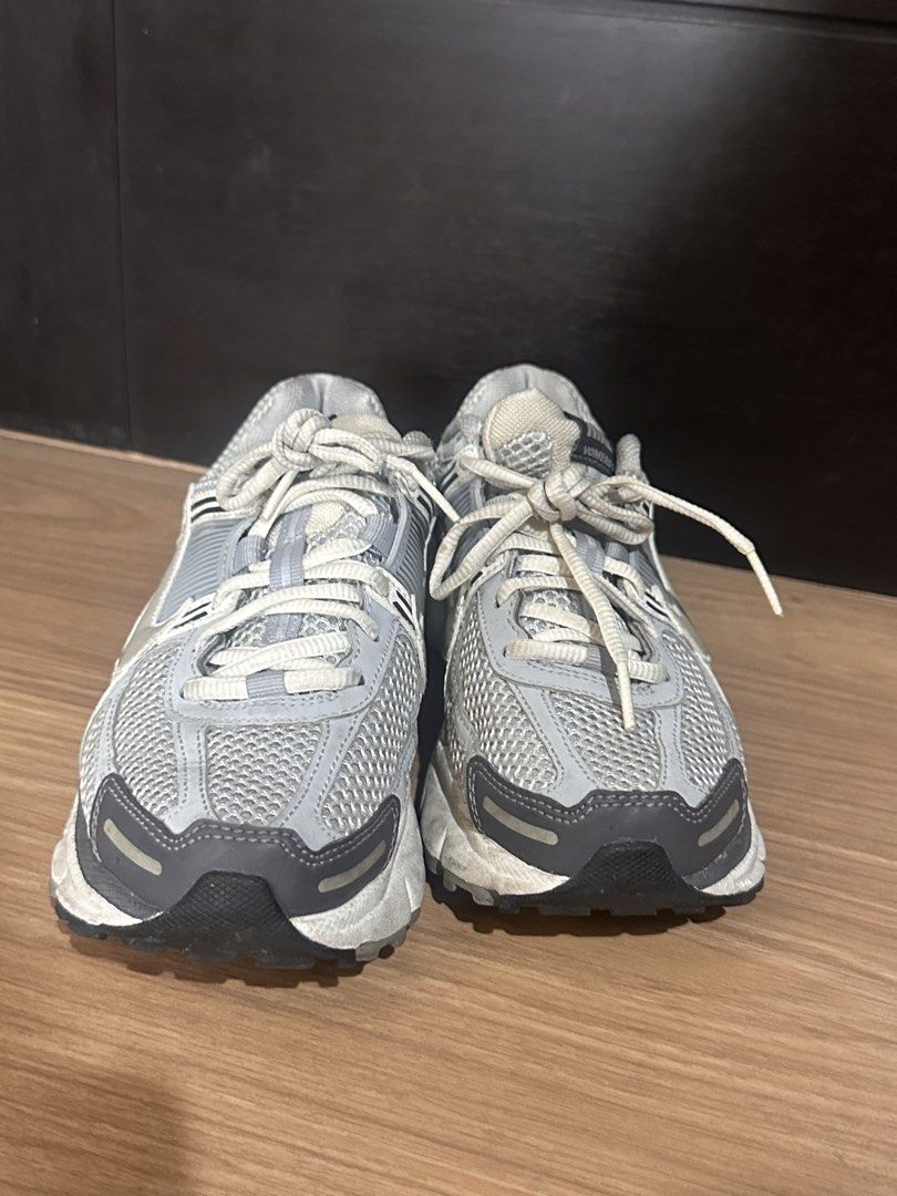 Nike Vomero 5 Metallic Silver (Category: Sneakers) located in Quezon City. Submitted by shop.marga (Listing ID 1467856132, Image 2). Description: - Brand: Nike Vomero 5 - Size: US 6 / UK 3.5 / EUR 36.5 - Style: Chunky dad shoe / retro running model with mesh upper, cage details, and Cushlon midsole - Condition: Clean uppers with normal wear on soles and midsoles - Perfect for a comfortable daily sneaker rotation - Guarantee authentic, bought in T