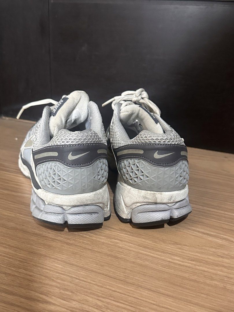 Nike Vomero 5 Metallic Silver (Category: Sneakers) located in Quezon City. Submitted by shop.marga (Listing ID 1467856132, Image 3). Description: - Brand: Nike Vomero 5 - Size: US 6 / UK 3.5 / EUR 36.5 - Style: Chunky dad shoe / retro running model with mesh upper, cage details, and Cushlon midsole - Condition: Clean uppers with normal wear on soles and midsoles - Perfect for a comfortable daily sneaker rotation - Guarantee authentic, bought in T