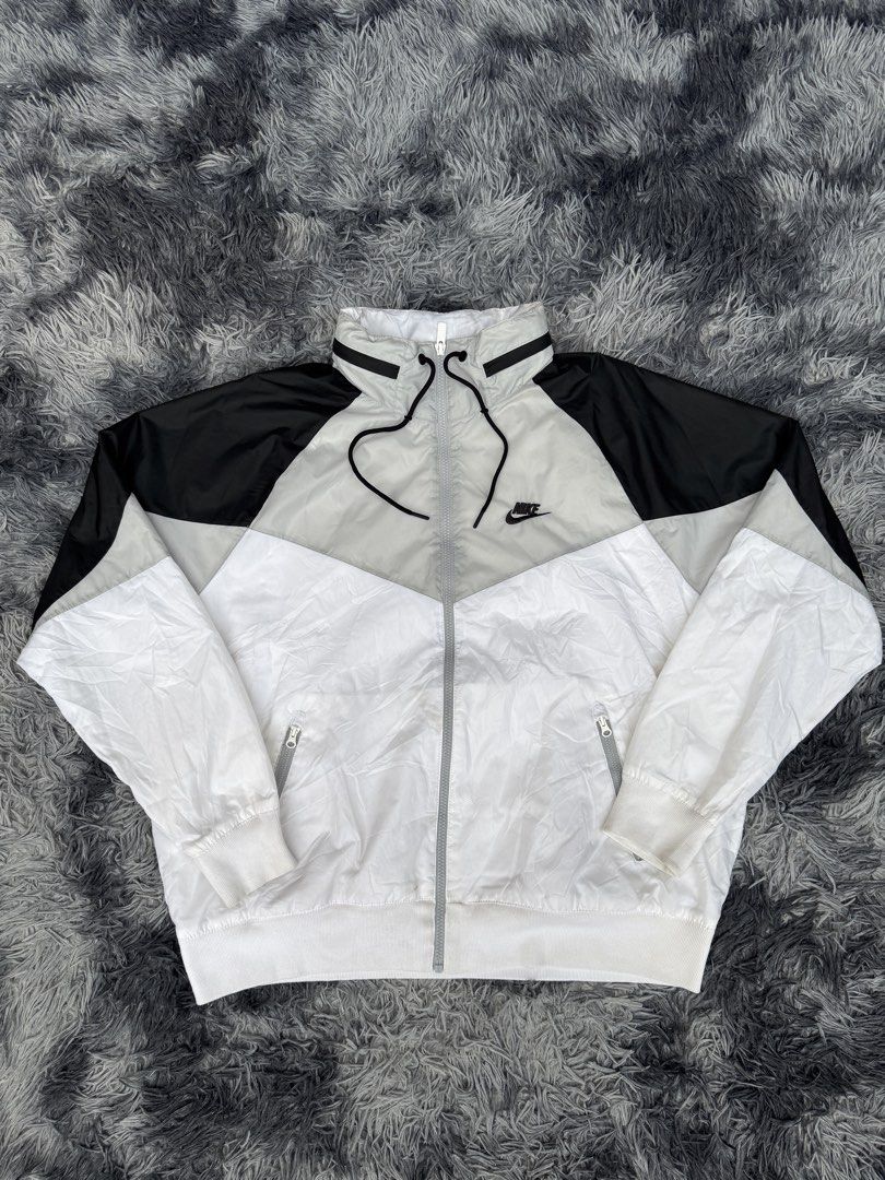 Nike Windrunner Jacket White Black Grey XL (Category: Coats, Jackets and Outerwear) located in Manila. Submitted by re_wear26 (Listing ID 1467880171, Image 2). Description: width 26.5 length 25.5 Color rate: 9.5/10 Issue: check comment color may vary due to lighting check comment section for more details 650.