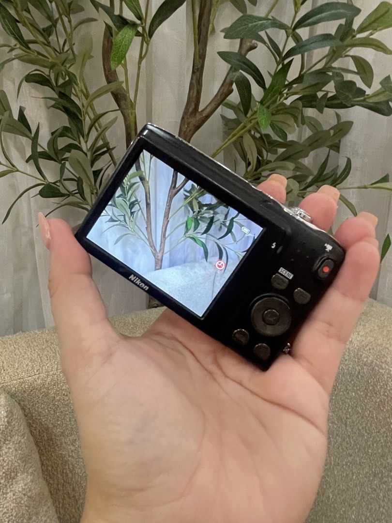 Nikon Coolpix S3100 (Category: Cameras) located in San Antonio. Submitted by katrizaclothing (Listing ID 1468058610, Image 3). Description: - 14.0 megapixel sensor for clear everyday photos - 5x optical zoom lens to get closer to the action - Bright purple finish for a fun, stylish look - Clear LCD screen with working live view - Simple button layout for quick and easy navigation - Pocket-sized design, perfect for travels and daily outings.