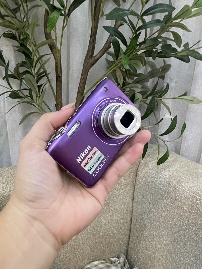 Nikon Coolpix S3100 (Category: Cameras) located in San Antonio. Submitted by katrizaclothing (Listing ID 1468058610, Image 2). Description: - 14.0 megapixel sensor for clear everyday photos - 5x optical zoom lens to get closer to the action - Bright purple finish for a fun, stylish look - Clear LCD screen with working live view - Simple button layout for quick and easy navigation - Pocket-sized design, perfect for travels and daily outings.
