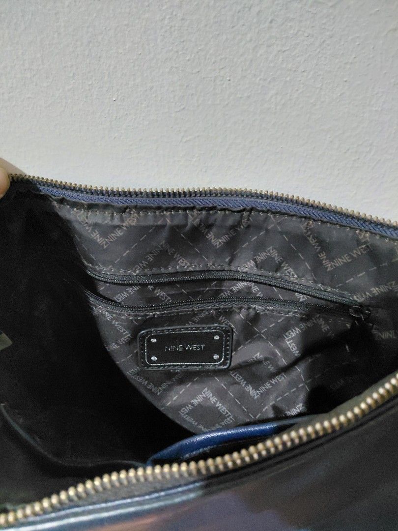 Nine West Crossbody Bag (Category: Cross-body Bags) located in Tarlac. Submitted by wornwardrobe (Listing ID 1468057788, Image 2). Description: Needs cleaning Misshapen due to storage Kindly note that all items are stored at my parents' house and not on hand. Retrieval takes up to 2 weeks before shipping. Please purchase only if you're okay with the wait. Message me to check the next available shipping date! Thank you!.