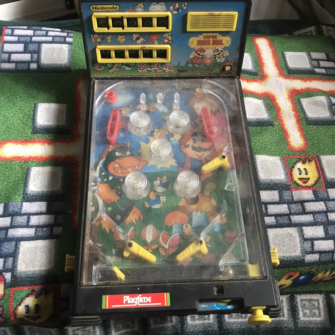 Nintendo Super Mario Bros Playtime Tabletop Pinball Machine (Category: Board Games & Puzzles) located in Rizal. Submitted by makoroku89 (Listing ID 1467859909, Image 1). Description: - Vintage Super Mario Bros. tabletop pinball game by Playtime 1988 -For restoration or repair Note: Please message me first before decide to purchase..