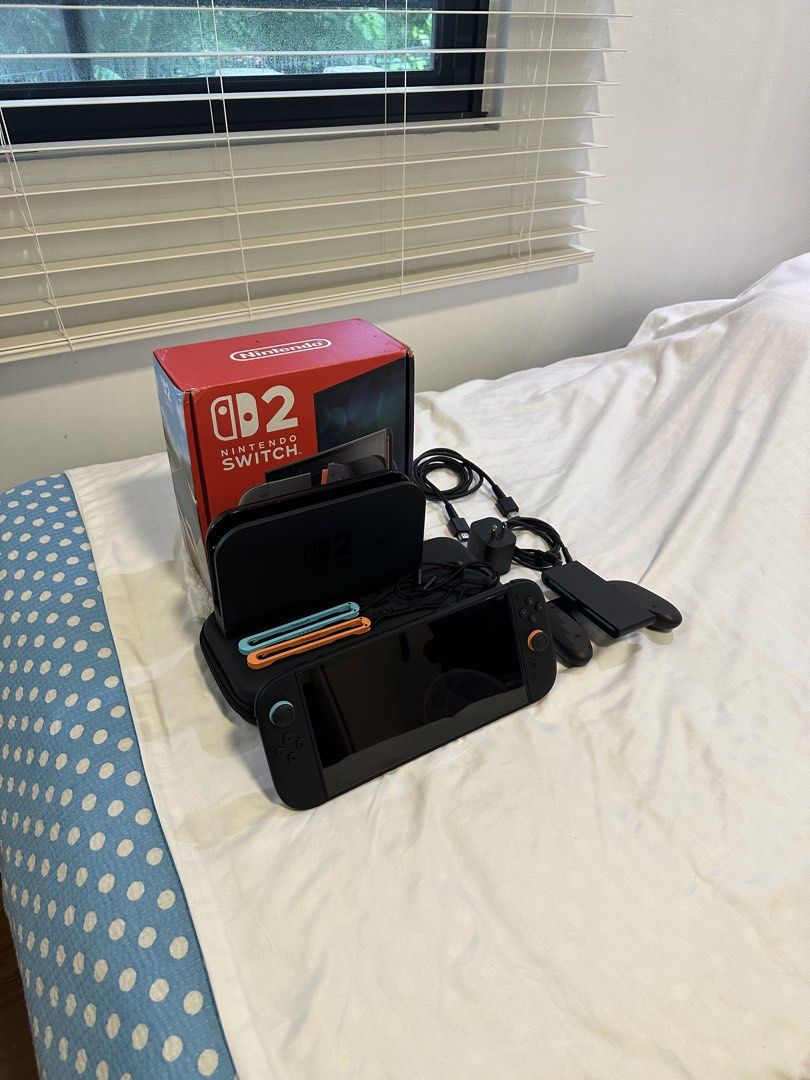 Nintendo Switch 2 Console Full Bundle (Category: Nintendo) located in Manila. Submitted by takao.baltazar (Listing ID 1467855093, Image 2). Description: Complete Nintendo Switch 2 setup with console, dock, controllers, power adapter, HDMI cable, straps, and protective case. Original retail box included. Everything packed neatly and ready for play. Great bundle for gaming at home or on the go. Bought last July 14, 2025 pero hindi ko siya nagagamit