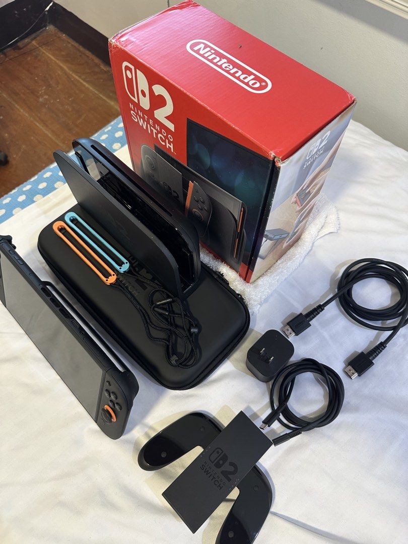 Nintendo Switch 2 Console Full Bundle (Category: Nintendo) located in Manila. Submitted by takao.baltazar (Listing ID 1467855093, Image 1). Description: Complete Nintendo Switch 2 setup with console, dock, controllers, power adapter, HDMI cable, straps, and protective case. Original retail box included. Everything packed neatly and ready for play. Great bundle for gaming at home or on the go. Bought last July 14, 2025 pero hindi ko siya nagagamit