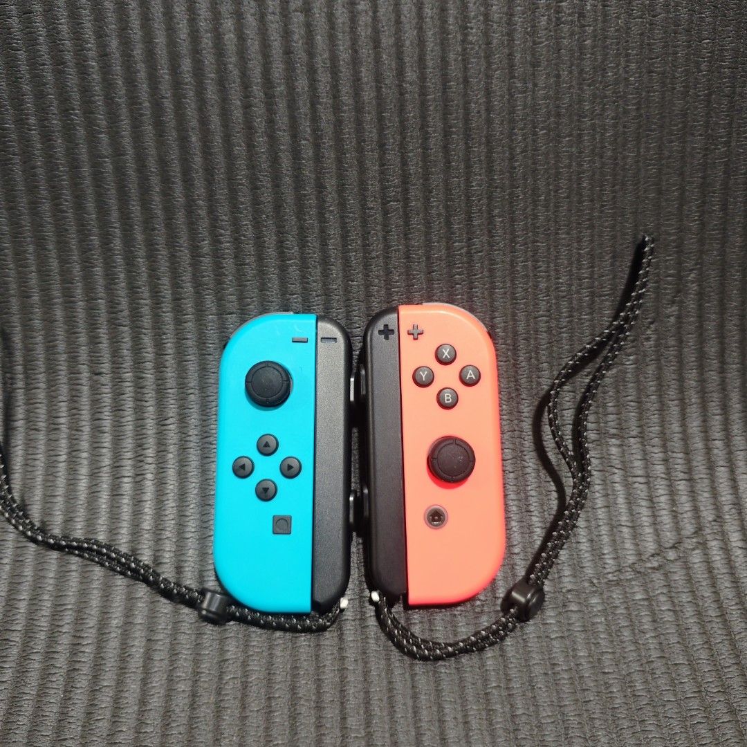 Nintendo Switch Joycon Neon Blue and Red Original (Category: Controllers) located in Quezon City. Submitted by shopme_gadget30 (Listing ID 1467998243, Image 1). Description: kindly read the details first for sale fixed price Good Condition tested and working no drifting all buttons working compatible to Nintendo switch v1/v2/ or oled original with strap qc area meet up: sm north shipping fee must shoulder by the buyer via lalamove or grab payment