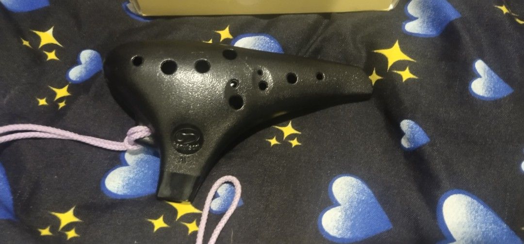 Noble Ocarina Plastic AC Multi-Chamber Set (Category: Musical Instruments) located in Muntinlupa City. Submitted by grayfox05 (Listing ID 1467964771, Image 3). Description: - Set of 2 plastic AC ocarinas in green and black - Lightweight and durable synthetic resin material, perfect for beginners and practice - Black ocarina comes with a purple neck lanyard attached - Includes original boxes and instruction pamphlets for both units - Condition: Gr