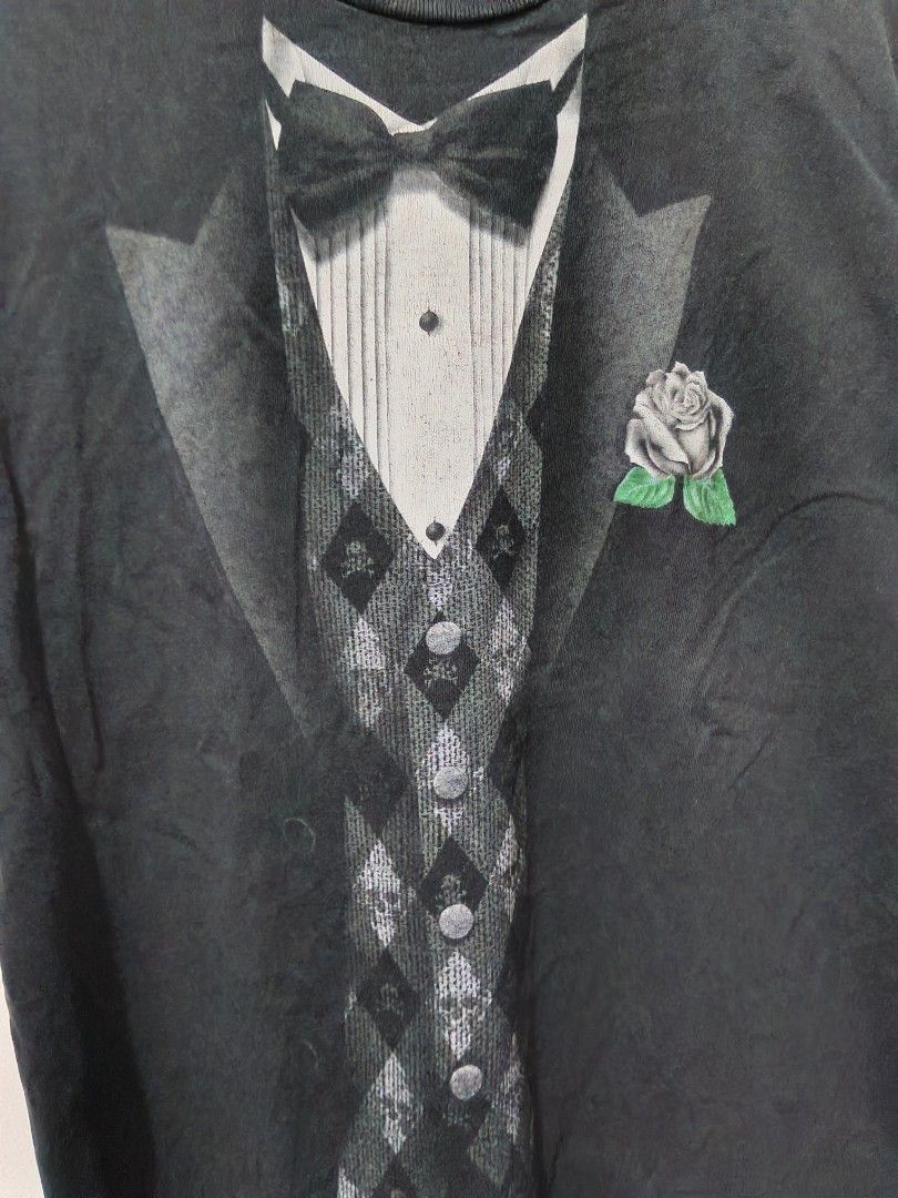 Novalty Tuxedo (Category: Tshirts & Polo Shirts ) located in Taguig. Submitted by thriftedminds (Listing ID 1468011532, Image 2). Description: Item: Novalty Tuxedo🔥 ‎Size: Delta Proweight ‎Width: 22 ‎Length: 30 ‎Condition: Good ‎Issue: Stain, Penhole, Repair slice, Hairline DM to purchase 📩.