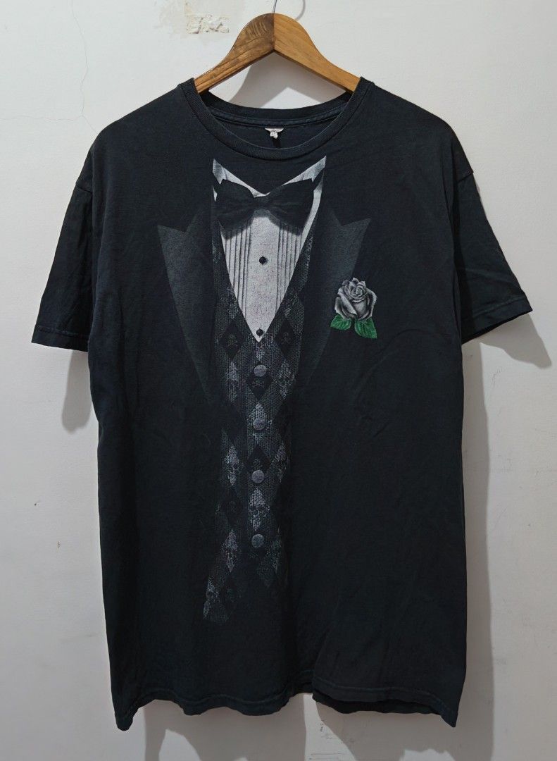 Novalty Tuxedo (Category: Tshirts & Polo Shirts ) located in Taguig. Submitted by thriftedminds (Listing ID 1468011532, Image 1). Description: Item: Novalty Tuxedo🔥 ‎Size: Delta Proweight ‎Width: 22 ‎Length: 30 ‎Condition: Good ‎Issue: Stain, Penhole, Repair slice, Hairline DM to purchase 📩.
