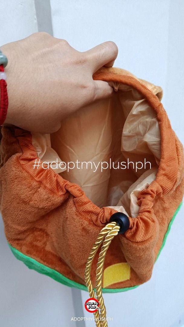 Novelty Plush Hamburger Design Backpack (Category: Plushies & Soft Toys) located in Taguig. Submitted by adopt.my.plush.ph (Listing ID 1467966662, Image 2). Description: 250.00 Novelty Plush Hamburger Design Backpack with a bun-shaped top flap, lettuce layer, and drawstring closure. .