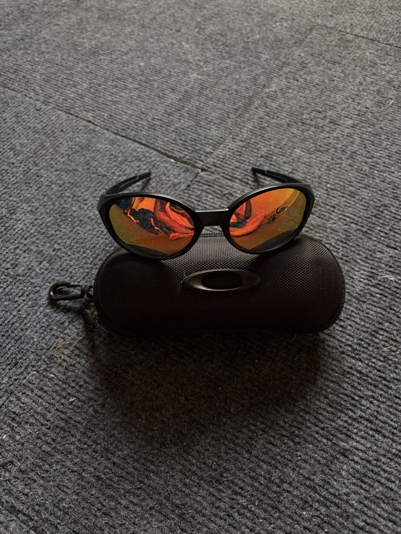 Oakley Jacket (inspired) Sunglasses (Category: Sunglasses & Eyewear) located in Manila. Submitted by toys_hats005 (Listing ID 1467960721, Image 1). Description: - Brand: Oakley - Frame Color: Black - Lenses: Reflective orange, clean with no major scratches - Inclusion: Original hard zippered case with metal ellipse logo and carabiner clip - Condition: Ready to wear.