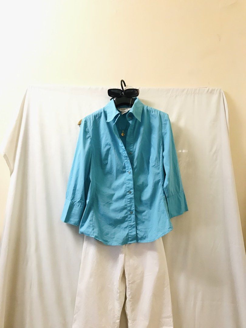 Ocean blue buttondown polo (Category: Blouses) located in Manila. Submitted by 414studio (Listing ID 1468043174, Image 1). Description: medium Good quality In good condition (Scarf and accessories are not included) .